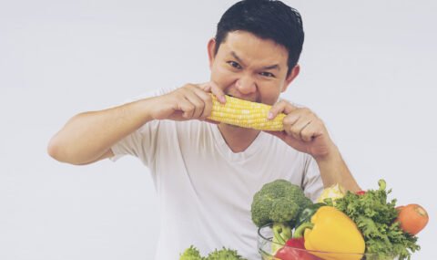 asian-man-showing-enjoy-expression-fresh-colorful-vegetables