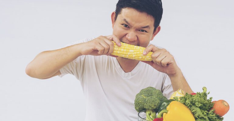 asian-man-showing-enjoy-expression-fresh-colorful-vegetables